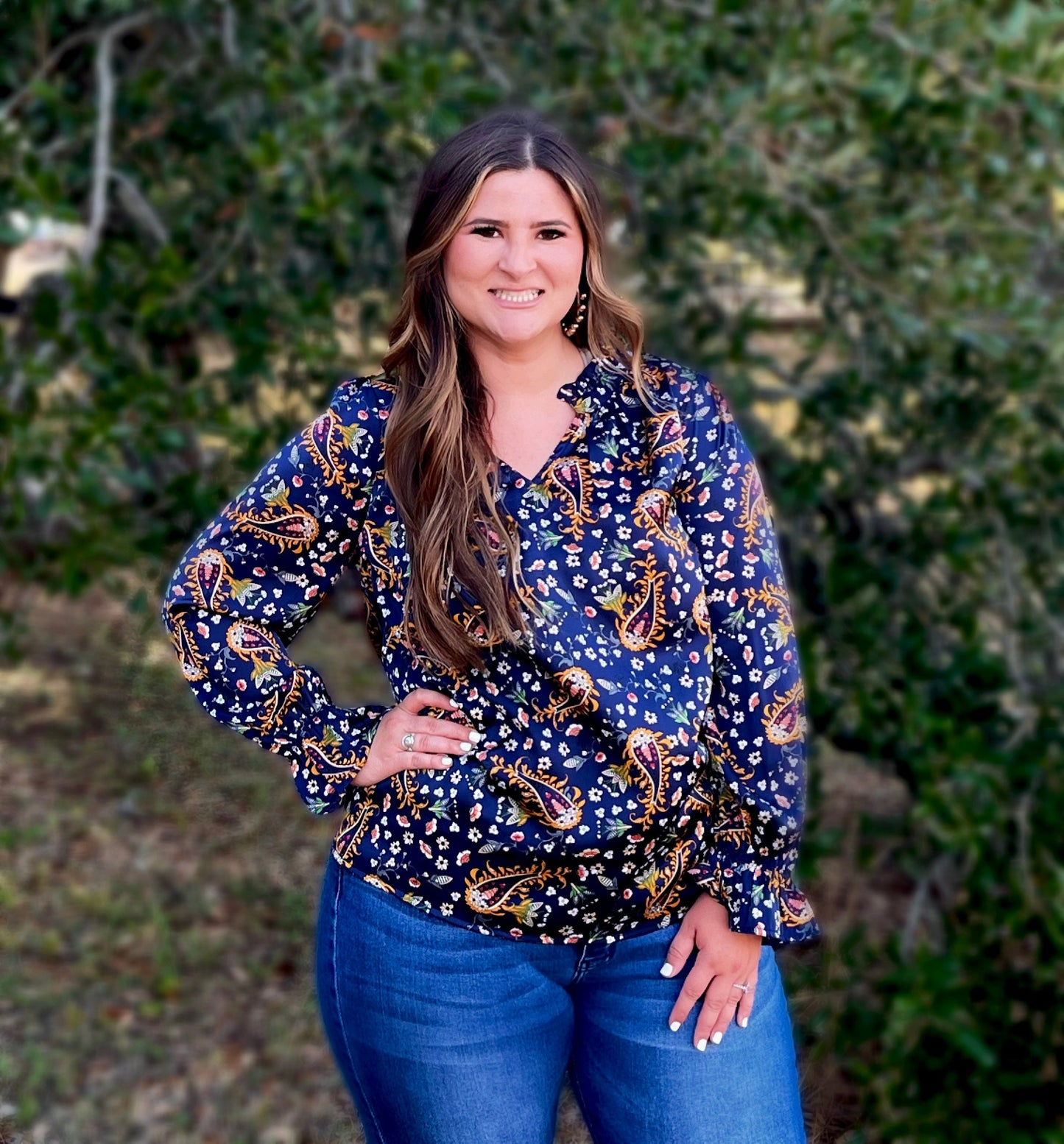 When paisley print meets chic! The Alli top by Washco Apparel includes a gorgeous paisley print, a notched v-neckline and silky detail. Alli makes a great top for work or play!