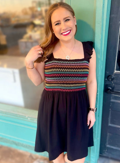 The Ashley Dress by Washco Apparel is fun, flirty and great for any spring or summer occasion! We love the stretching smocking detail at the top, ruffled sleeves and that it is an A-Line dress.