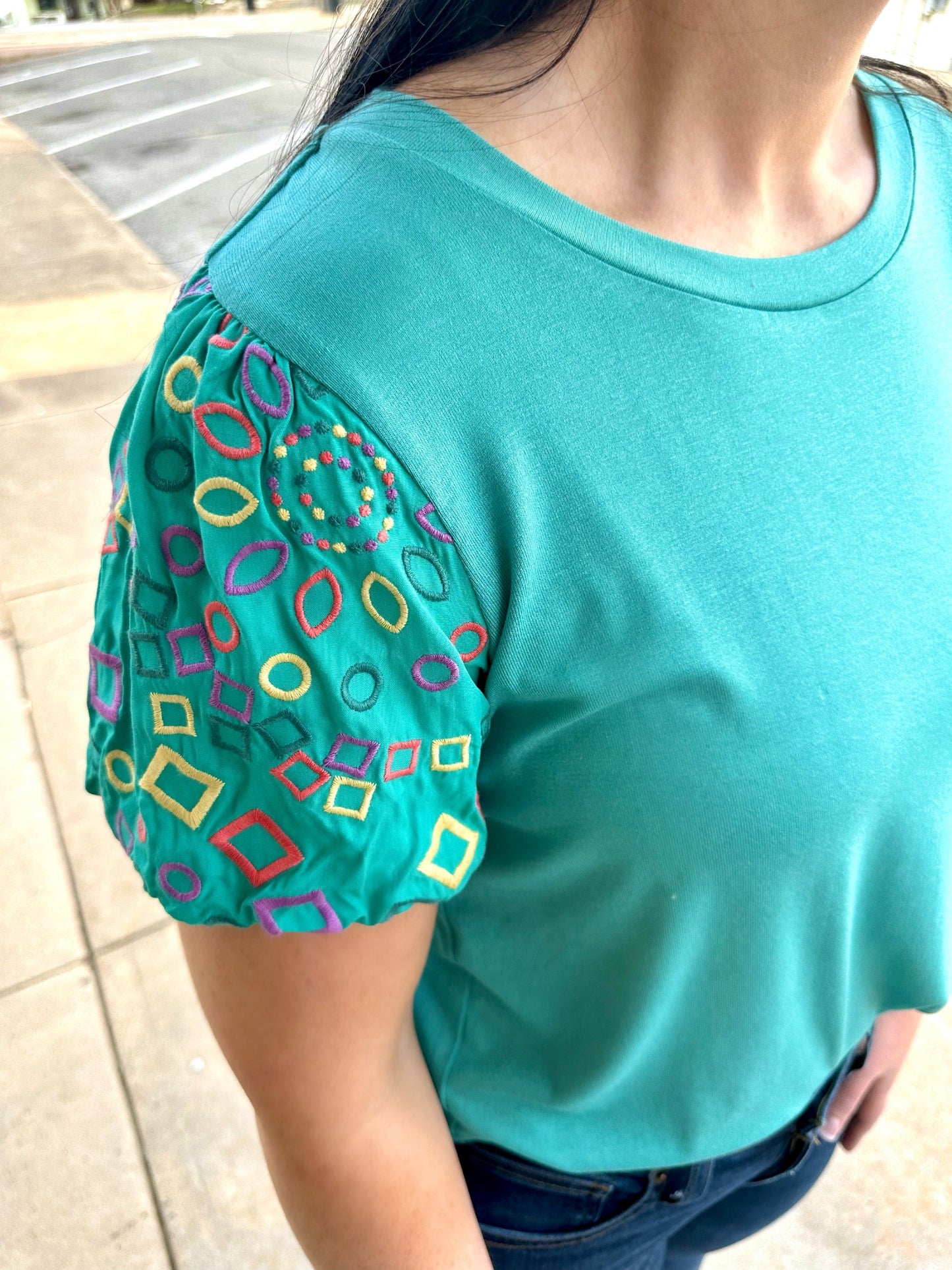 The Blair Top by Washco Apparel is soft, comfortable and cute for any occasion. We love the embroidered statement sleeves and that this material has stretch!