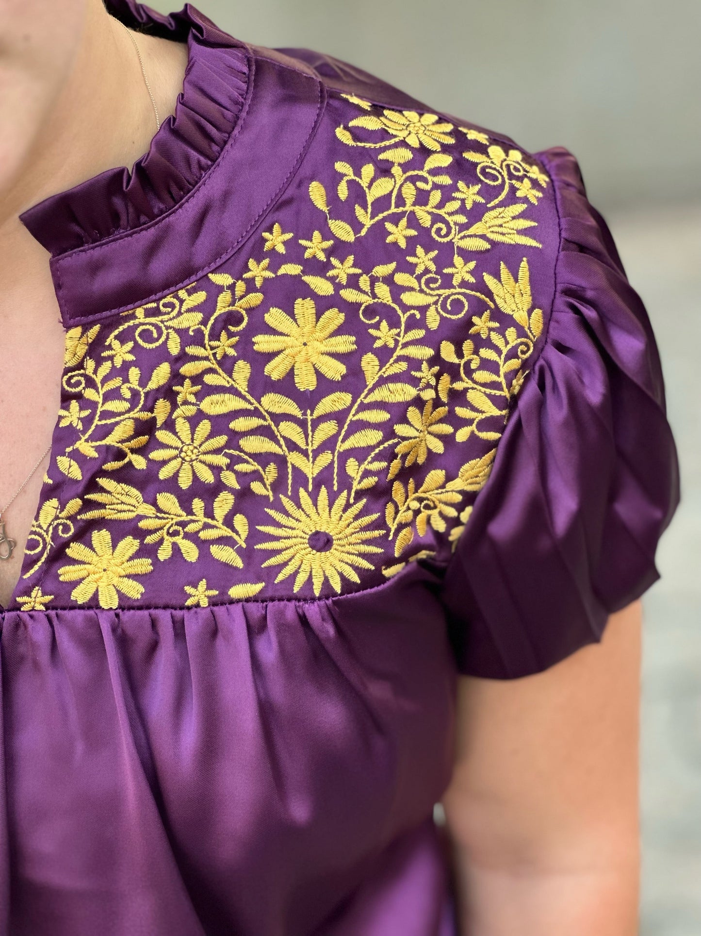 Hey LSU Fans, the Breck Top by Washco Apparel is fun, soft and silky! We love the pop of beautiful gold embroidery design on the front and that it is part of our Game Day Collection!