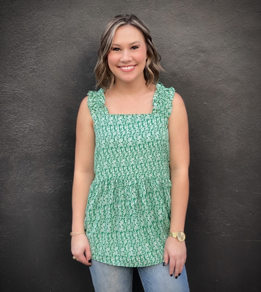 The Chloe Top by Washco Apparel is great top for Spring and Summer! This green and white printed top is fun and flirty with its ruffled sleeves and babydoll fit.