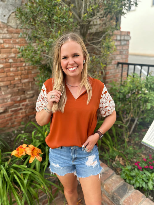  Calling all Texas Longhorn Fans! The Anna top by Washco Apparel is a part of our Game Day Collection and is perfect for showing off your school spirit! 