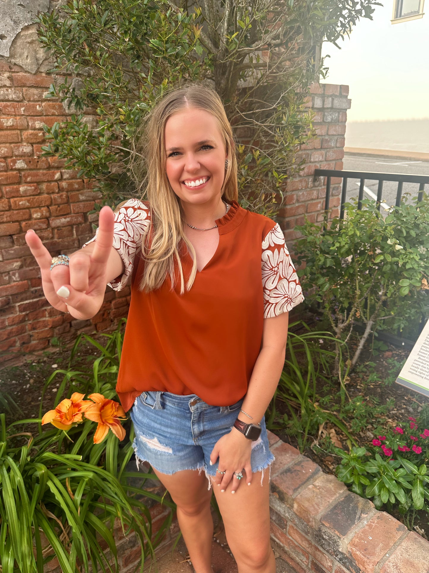  Calling all Texas Longhorn Fans! The Anna top by Washco Apparel is a part of our Game Day Collection and is perfect for showing off your school spirit! 