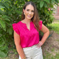 The Miranda top by Washco Apparel is a gorgeous hot pink silky top with ruffle sleeves. This statement top is great for work or play.