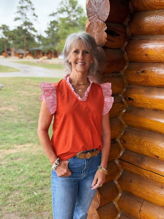 Orange top with stripes by Washco Apparel