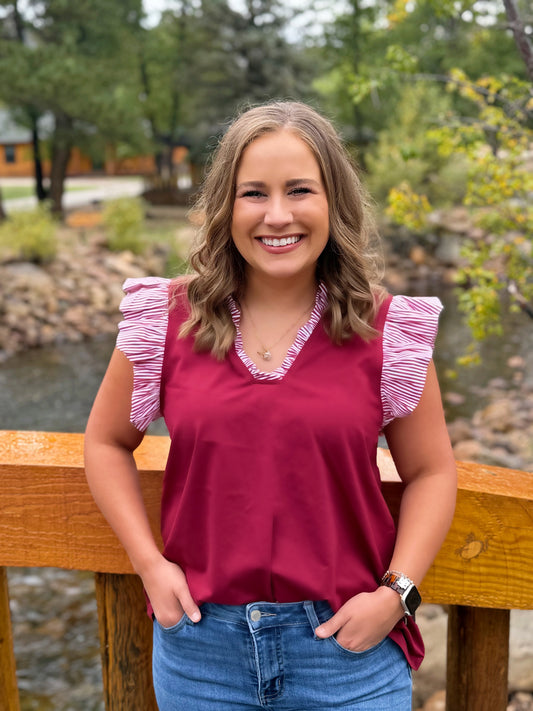 Maroon and White striped detailing on maroon top by Washco Apparel